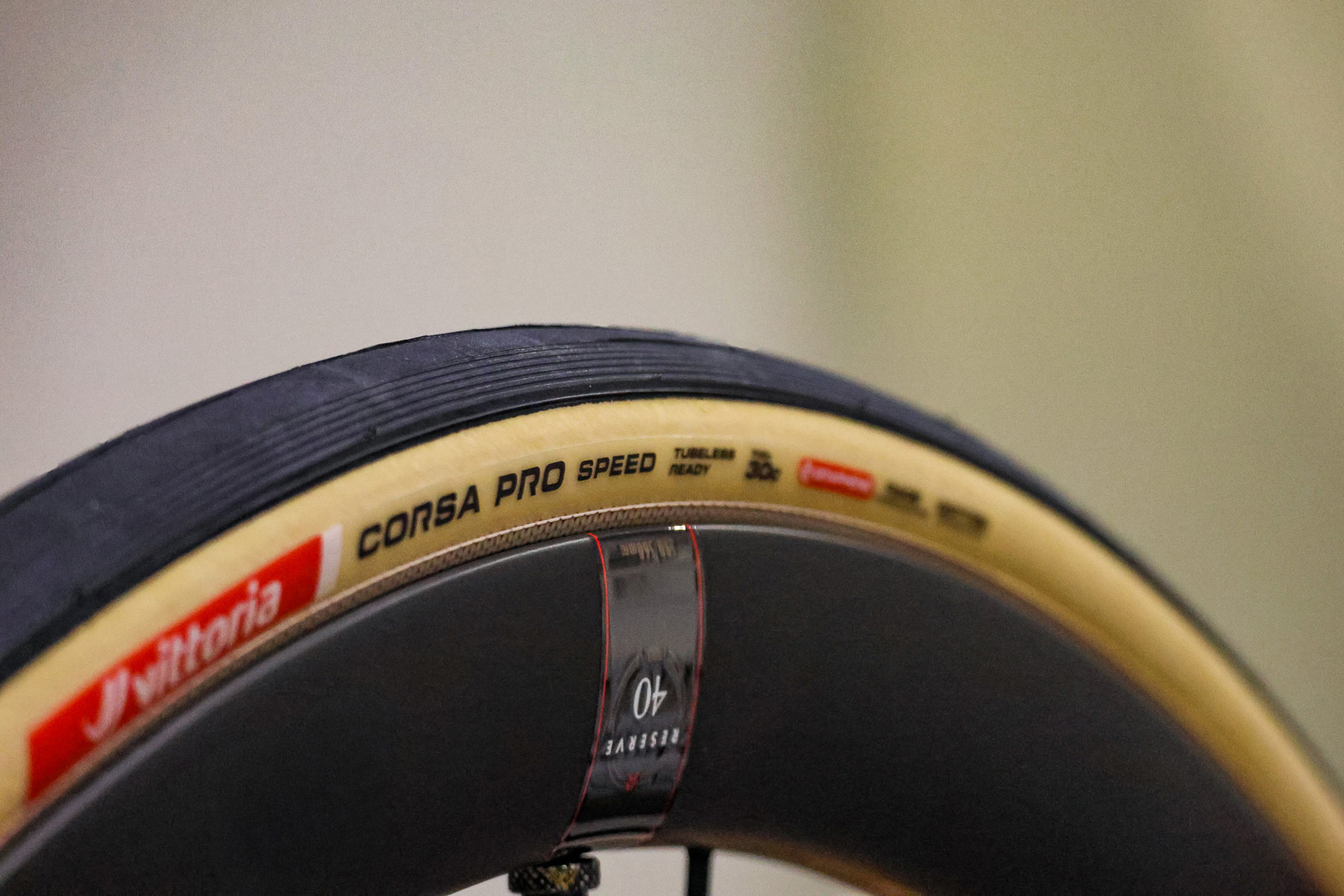 side angle view of vittoria corsa pro speed tubeless ready 30mm road bike tire with cotton casing.