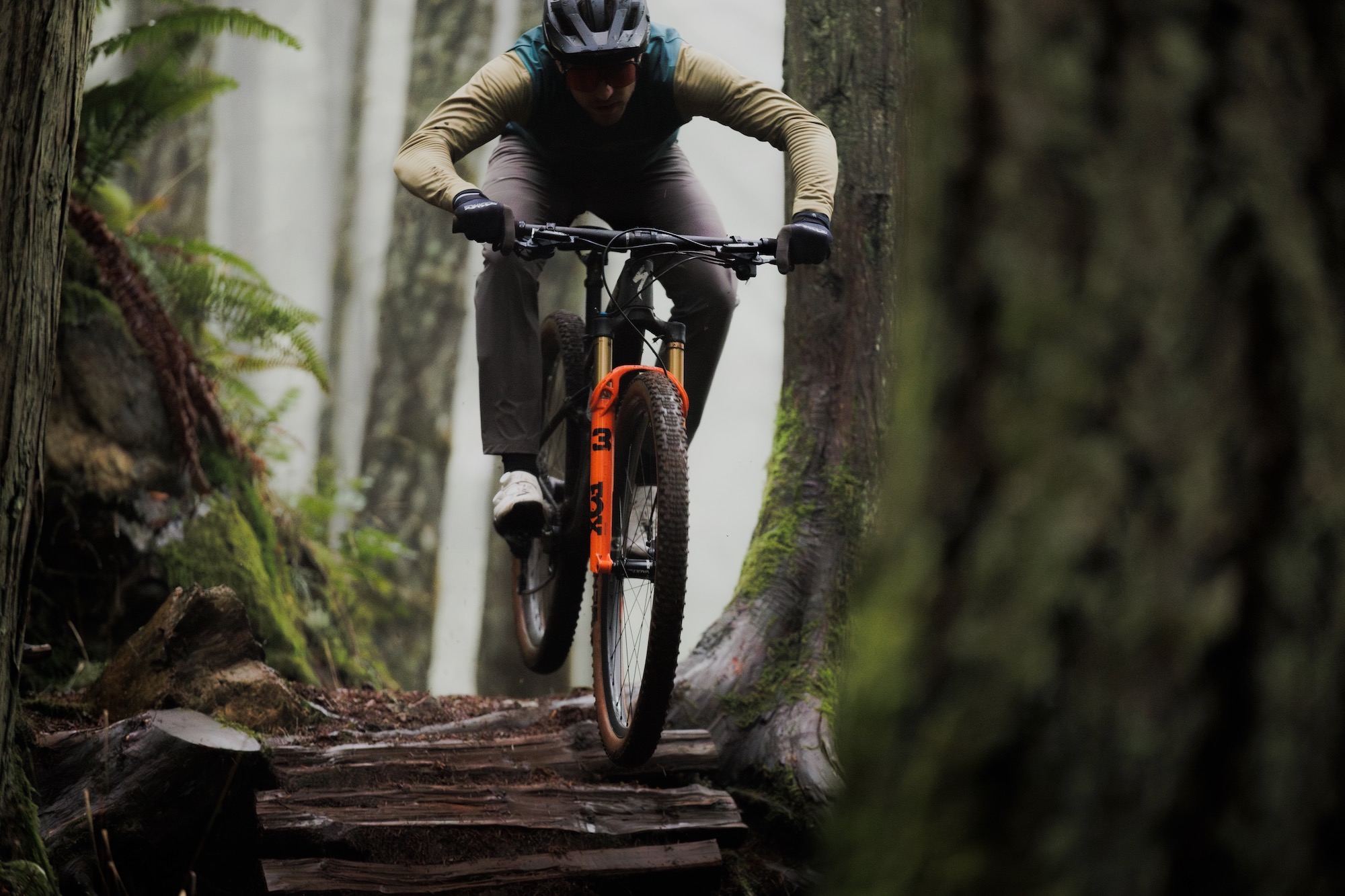 am man riding a mountain bike with the Era SL handlebar