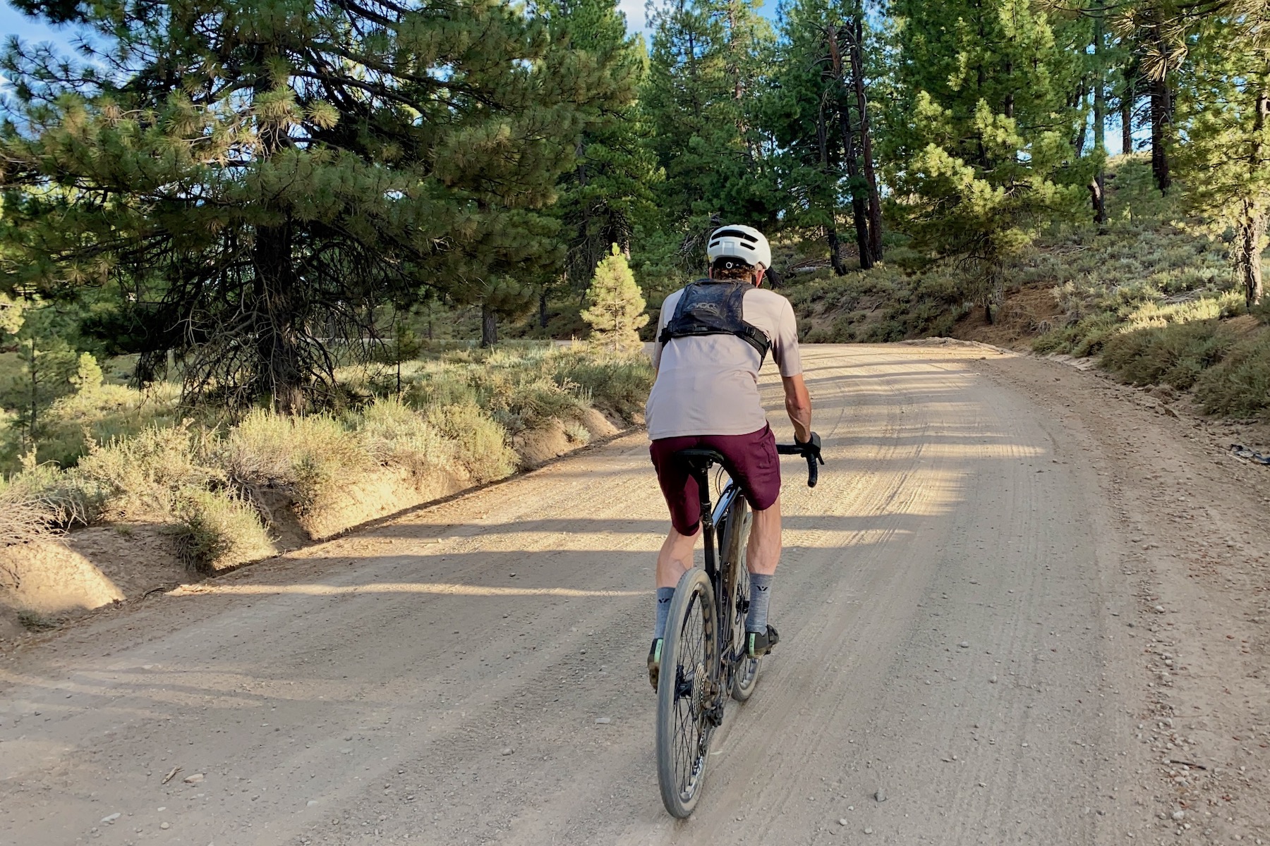 riding down a gravel road with the Ergon SR Allroad Core Pro Men saddle.