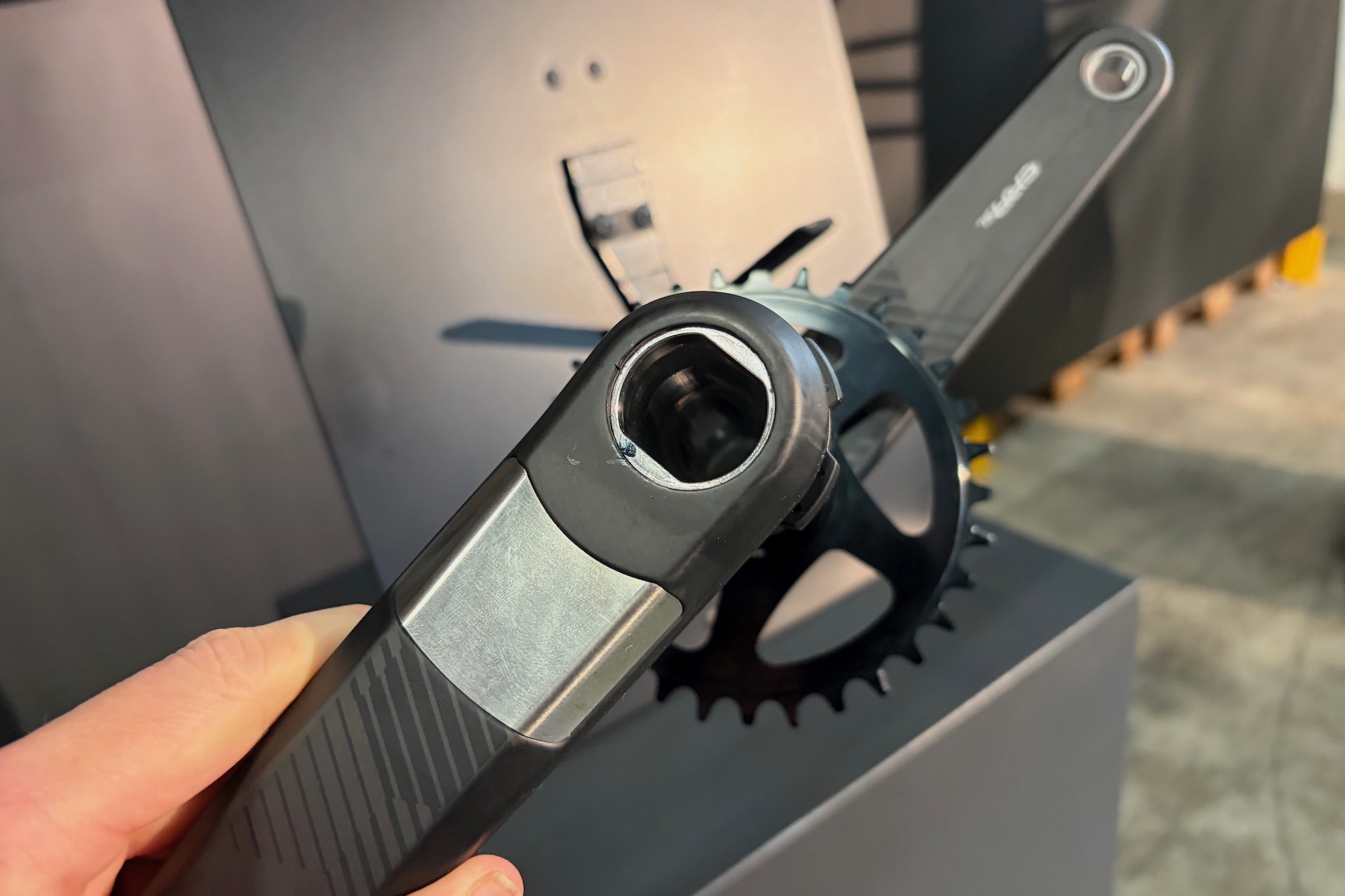 close view of the bonded spindle and the stainless steel wear plate on the era sl cranks