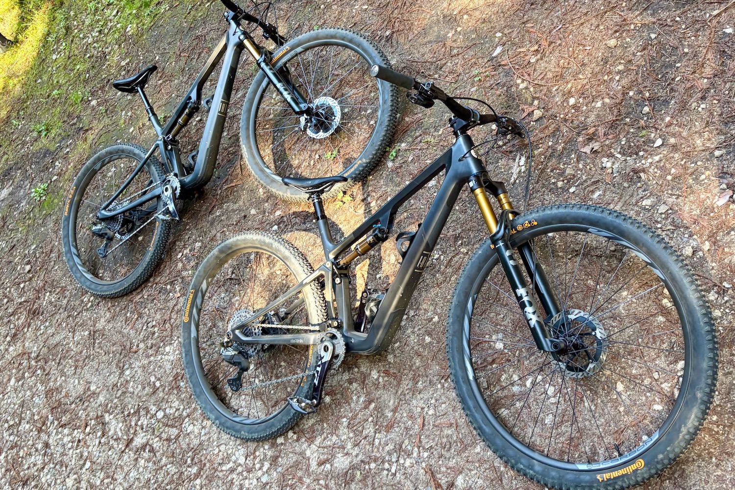 two black Ripley SL bikes with XTR builds laying on the ground.