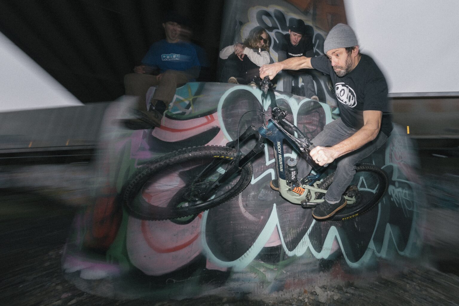wade simmons doing a wall ride wearing the roach t-shirt