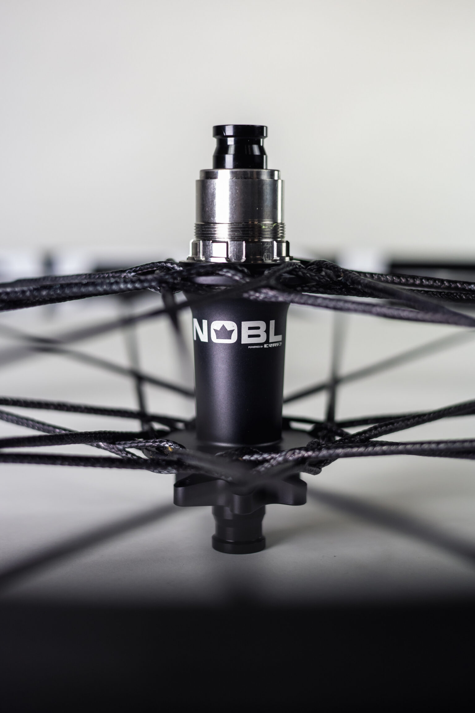 Ethos Ti70 hubs with Berd PolyLight-X spokes on enduro wheel