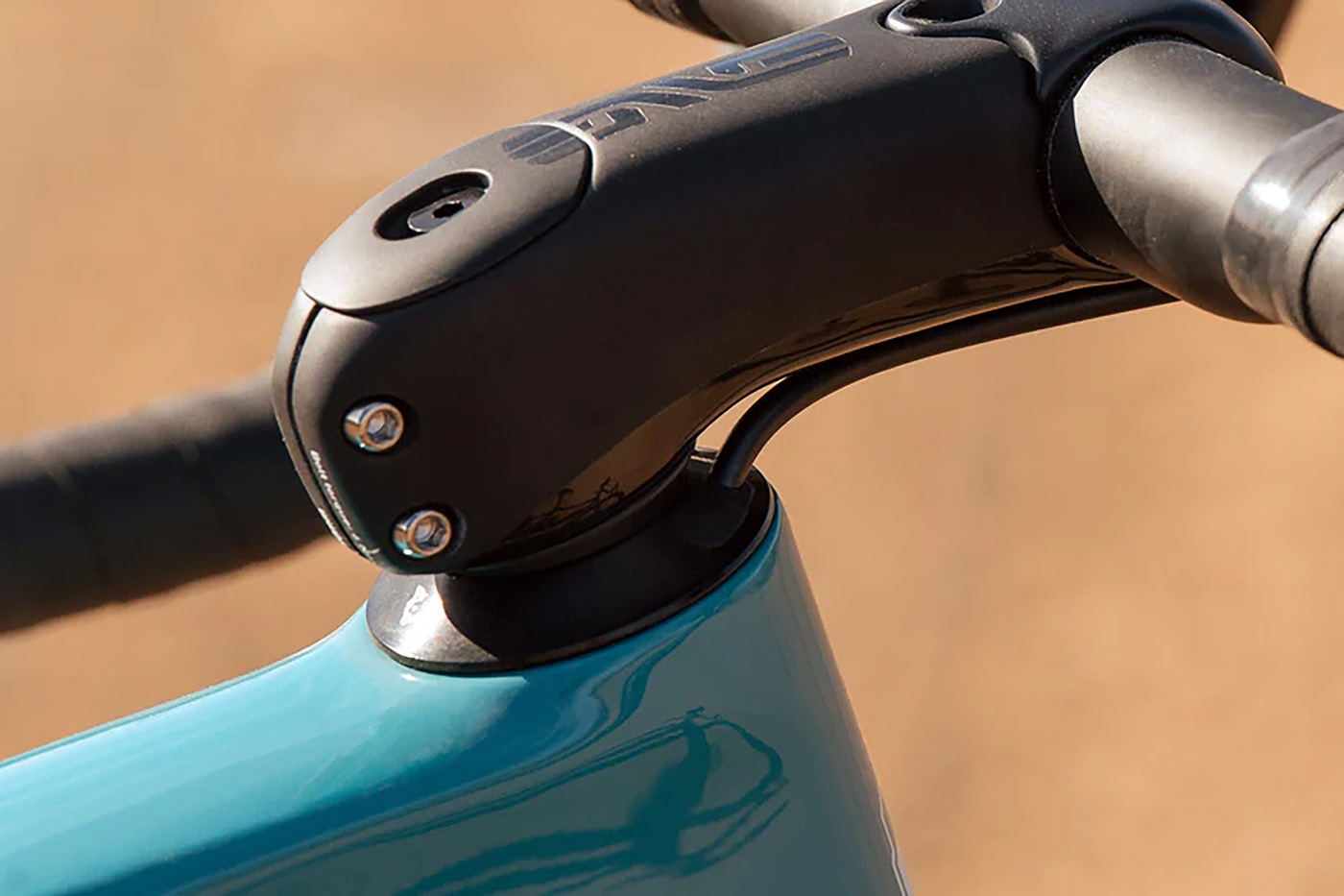 wolf tooth aero semi-internal headset shown on a bike with a slammed stem.