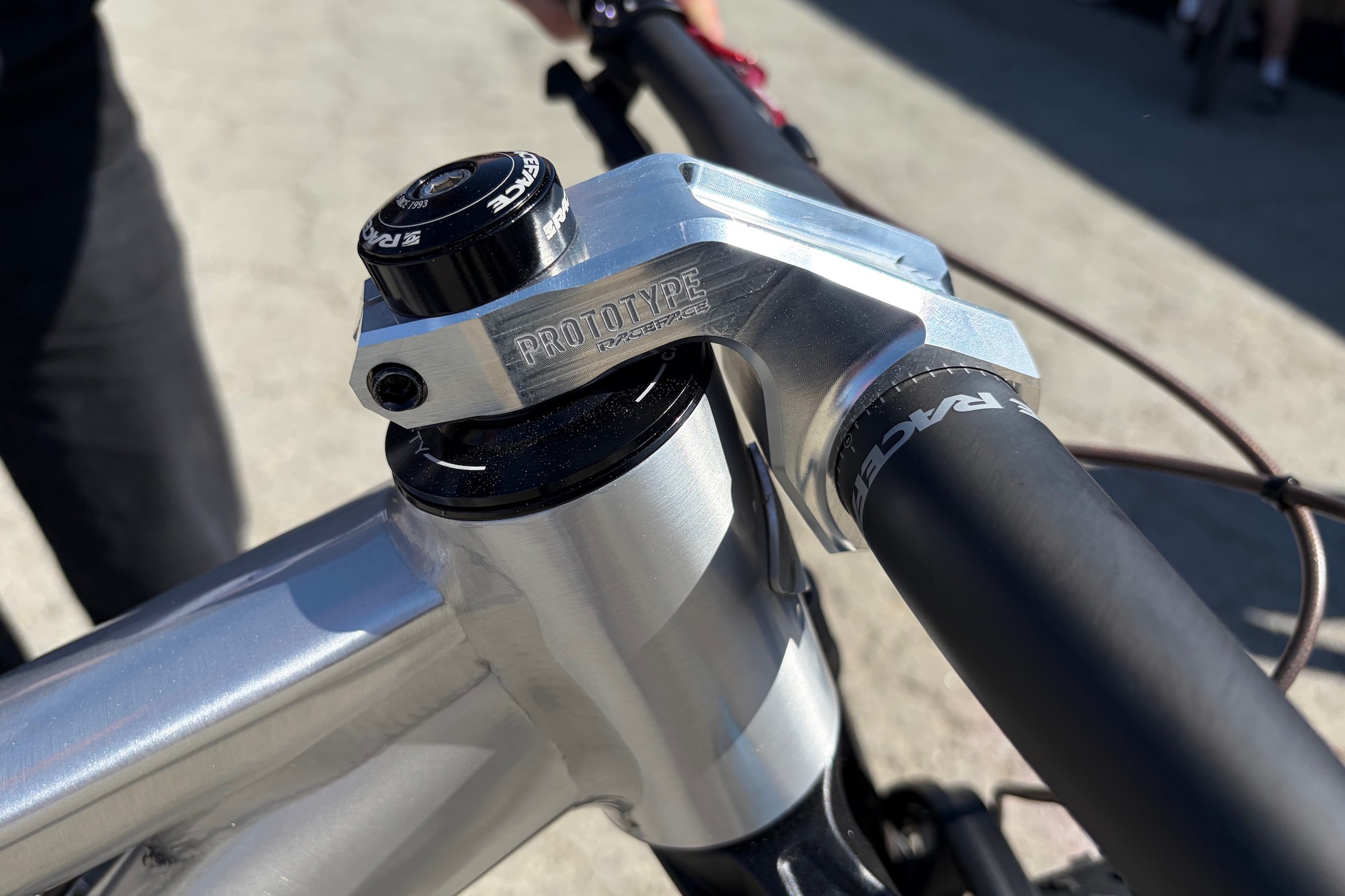 the aggresively dropped stem on the Ari Signal Peak prototype 32" mountain bike at Sea Otter.