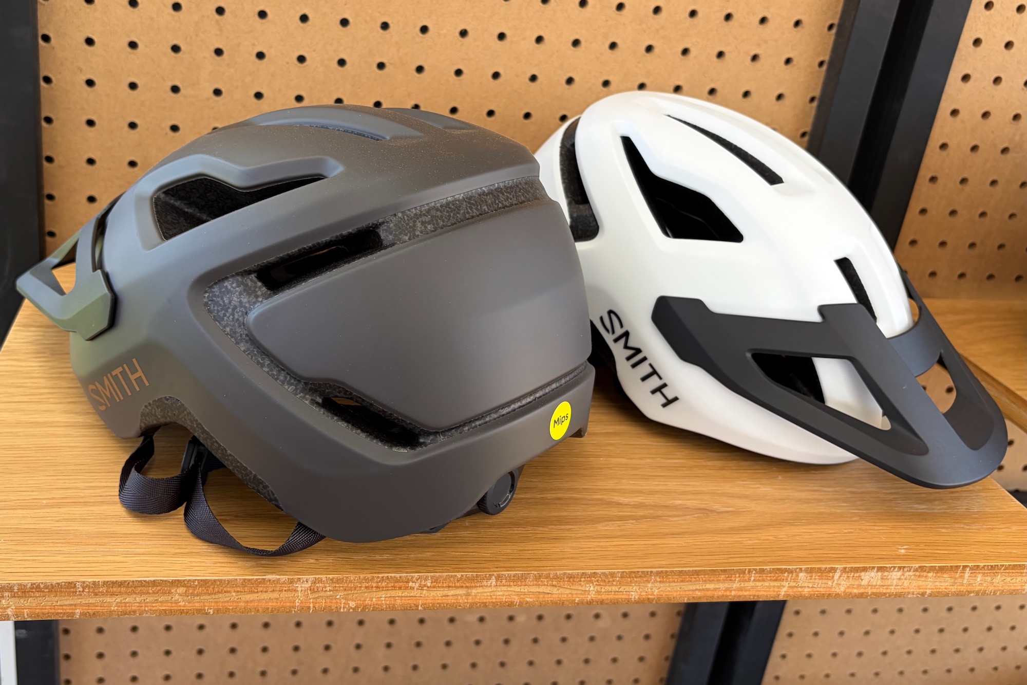 the smith pilot mtb helmet at sea otter, viewed from the front and the rear.