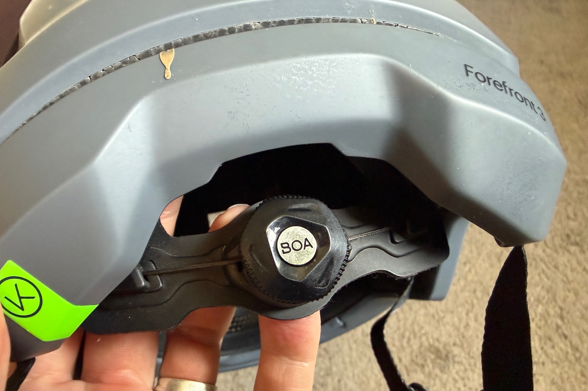 the BOA dial on the back of a mountain bike helmet.