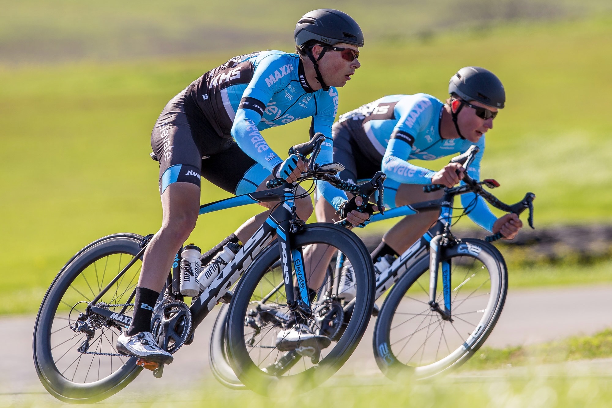 road racers riding on KHS team bikes
