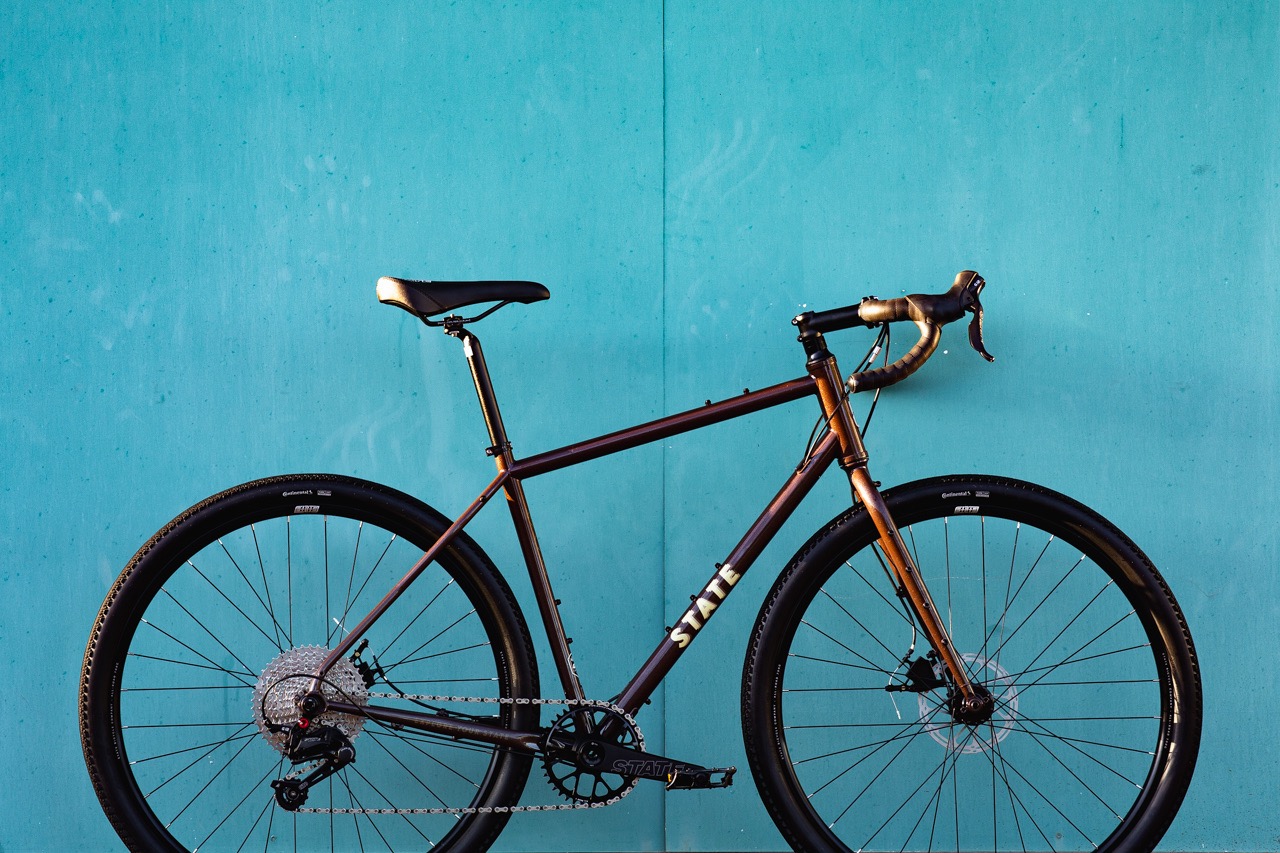 State Bicycles 2026 4130 All-Road lean