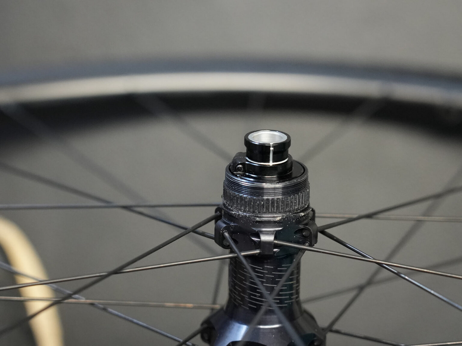 closeup details of hubs on fulcrum rapid red carbon gravel wheels.