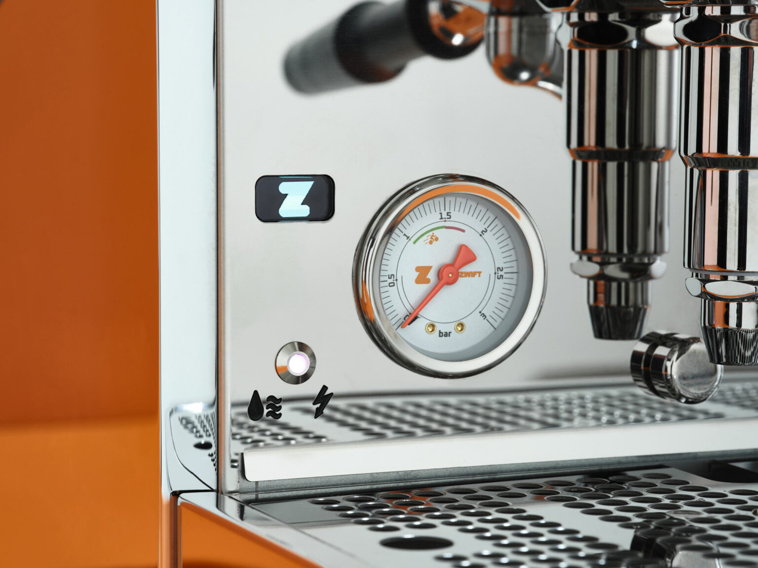 closeup details of custom gauges on zwift limited edition rocket espresso machine.