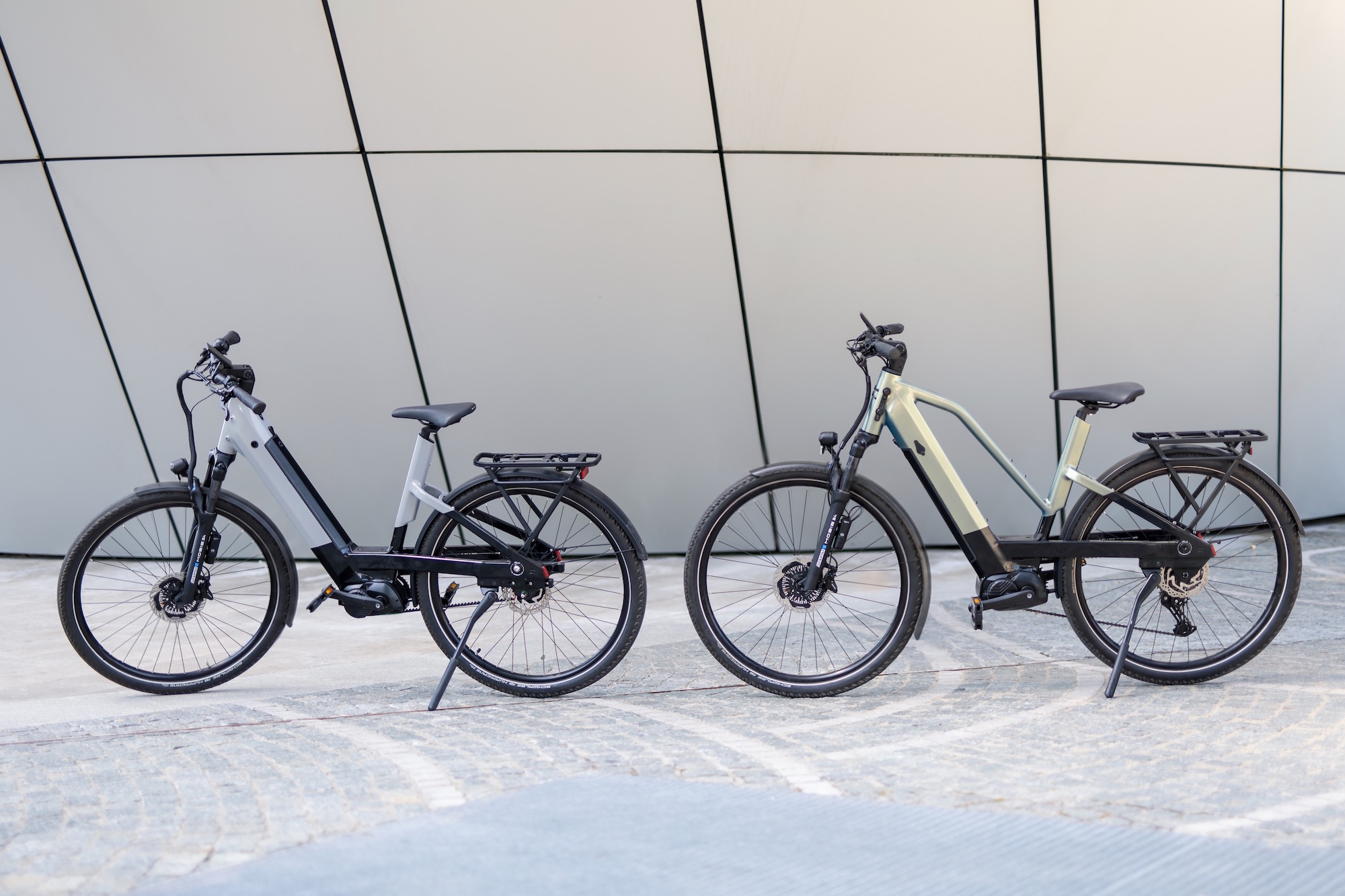 two e-bikes with the Blubrake NEO ABS attached to the fork.
