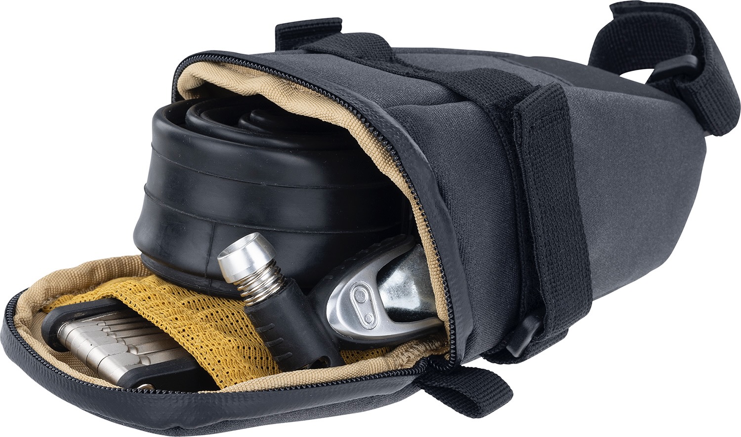studio image of the Evoc Seat Bag with some tools in it.