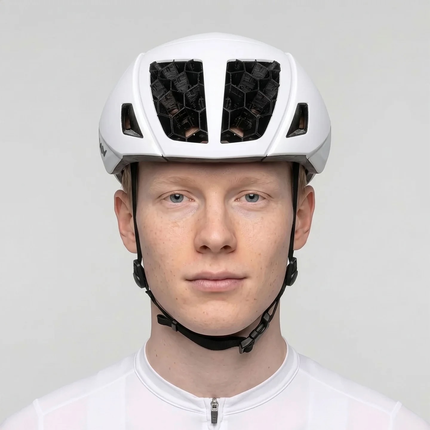 studio image of a man wearing the KAV Silvo in white, viewed from the front
