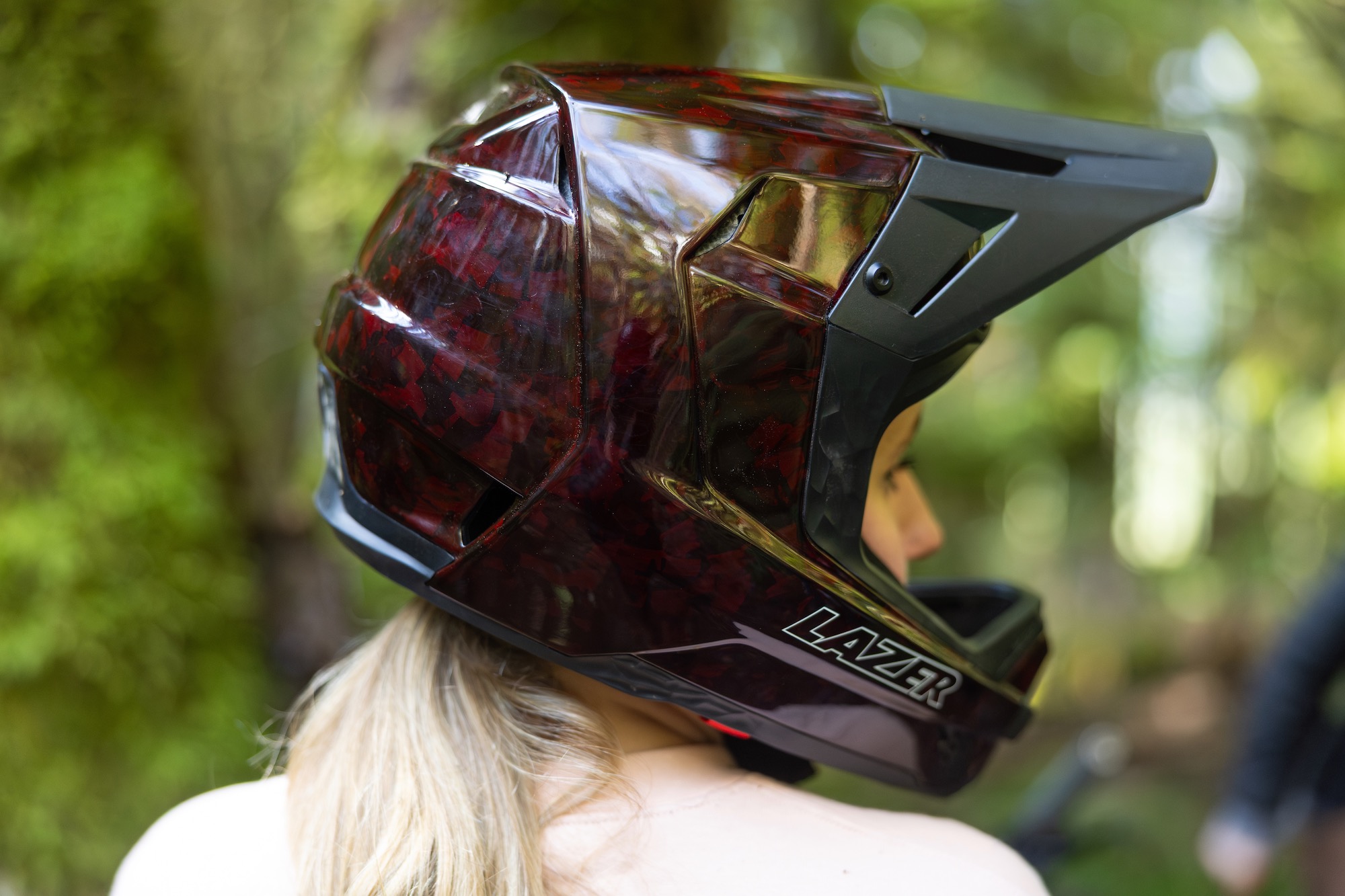 a woman wearing the Lazer A-line KinetiCore helmet.