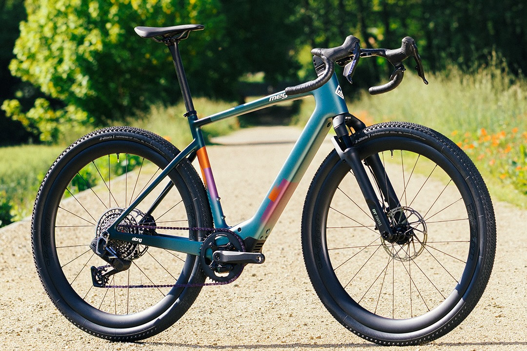 front angle profile shot of the Megamo ALong e-gravel bike in Pop Green with a suspension fork