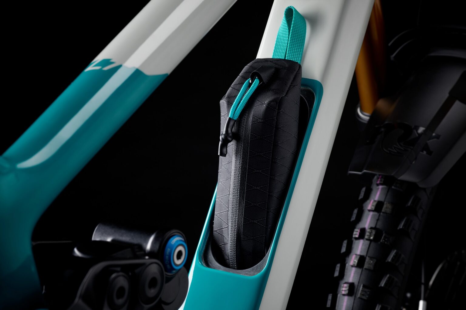 studio image showing the Cavity in-frame storage bag being pulled out of the Yeti LT