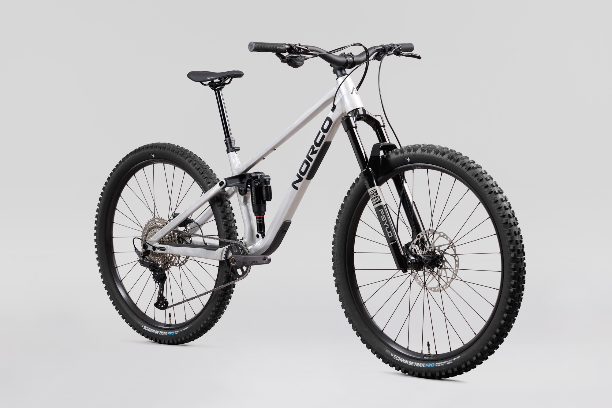 studio profile image of the Norco Fluid A2 in Raw Alloy Silver