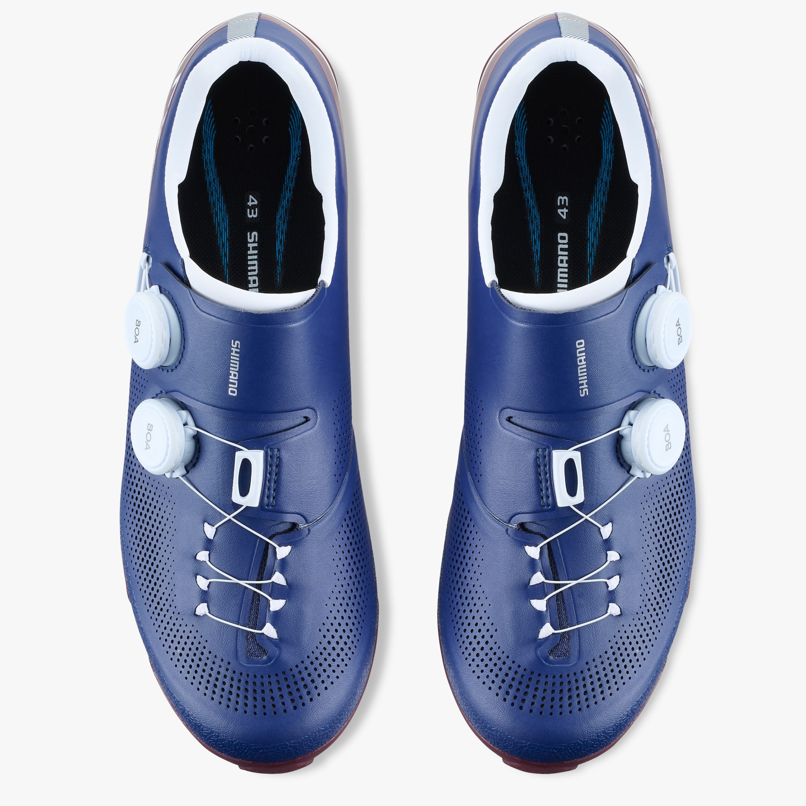 studio image of the pair of Shimano RX710 gravel shoes in navy, viewed from above.