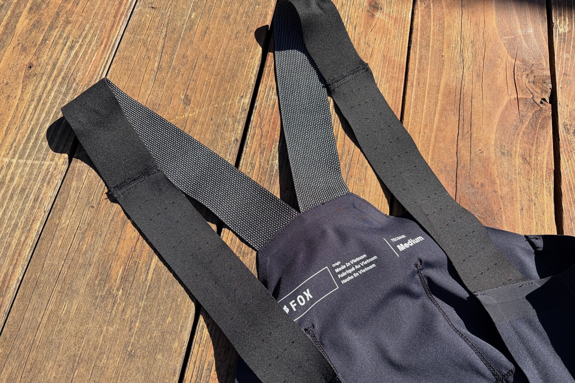 detail of the straps on the Fox Tecbase Bib liners showing the two different materials