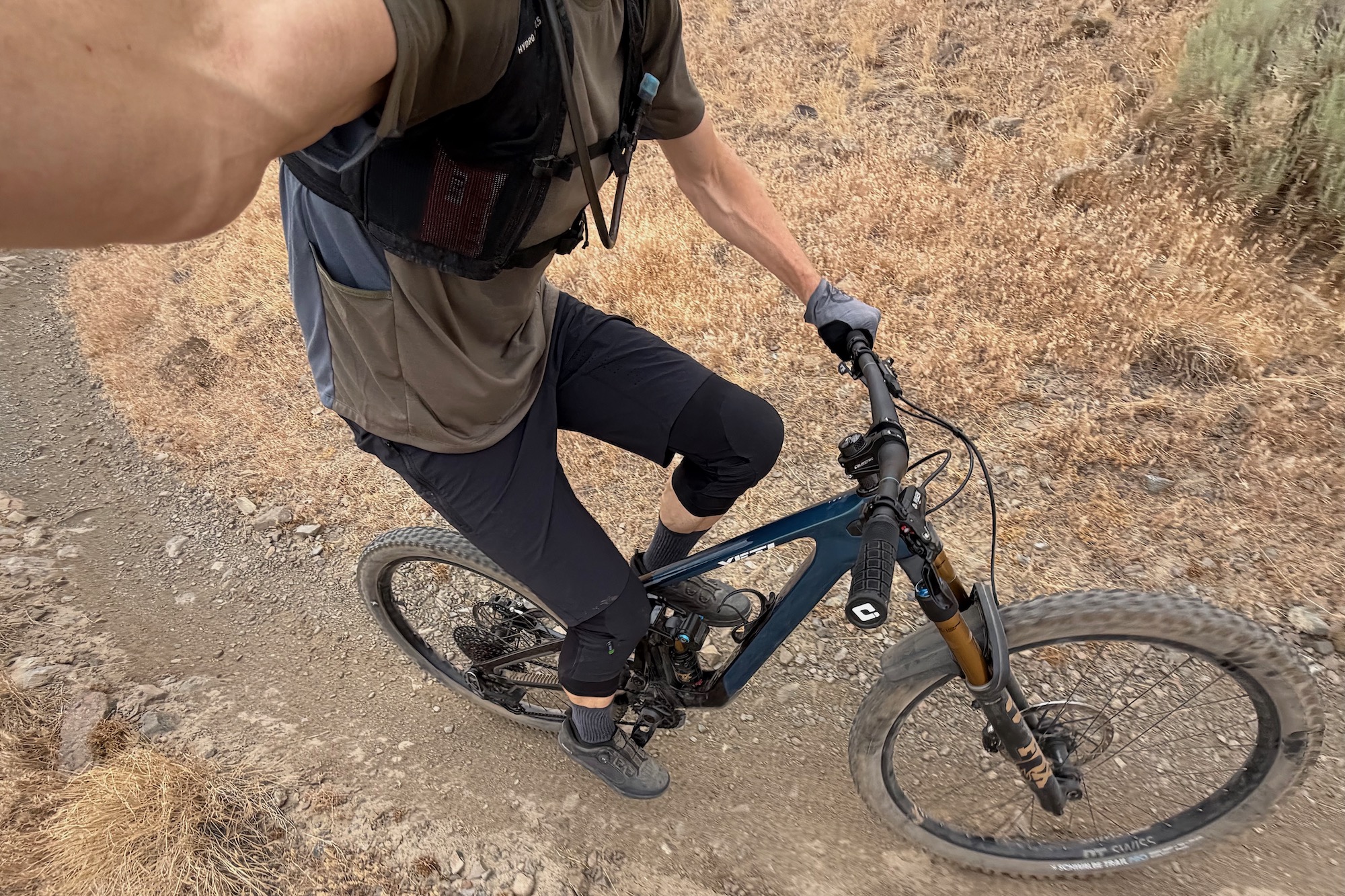 self shot picture riding with the Backcountry Slickrock Lite gloves